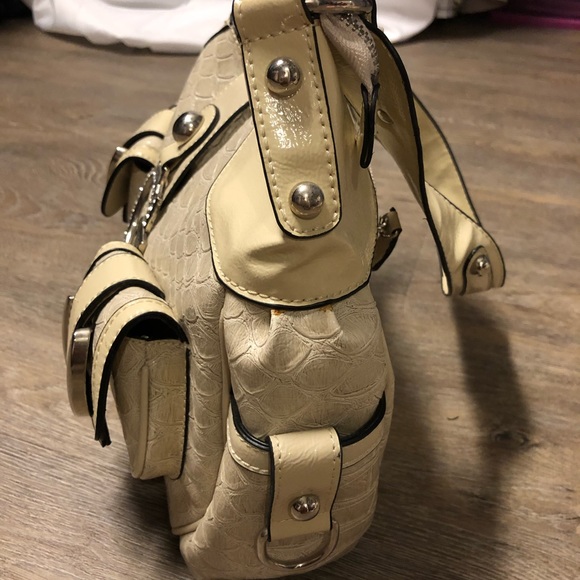 Guess Handbags - GUESS beige shoulder bag.